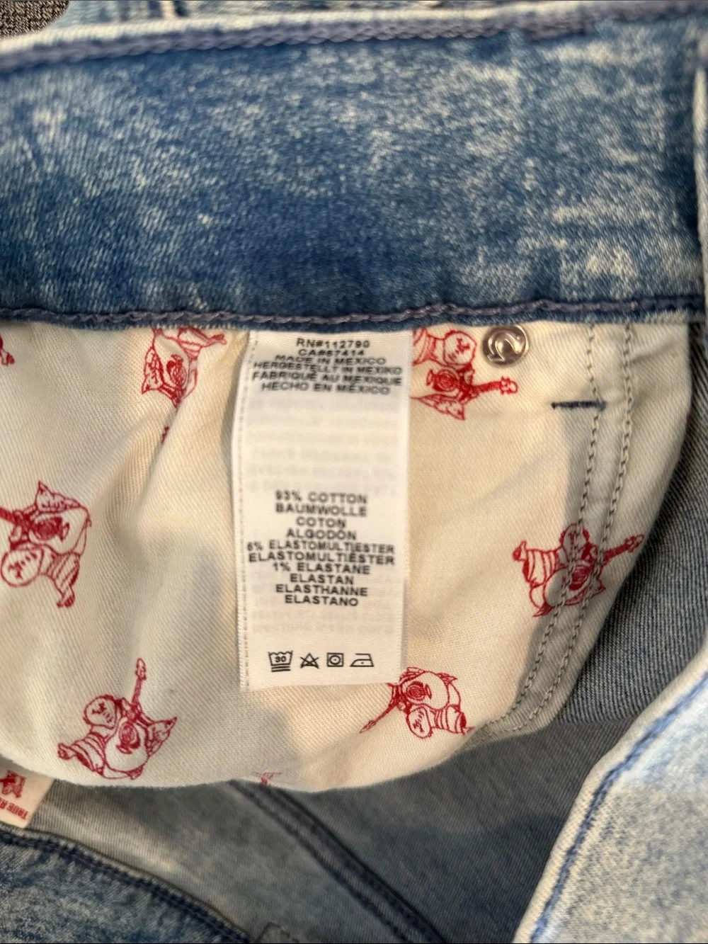 True Religion Acid Wash Blue Moto Jeans with Ribbed Knee